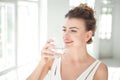 Portrait of a beautiful woman drinking water Royalty Free Stock Photo