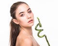 Portrait beautiful woman face portrait with green leaf , concept for skin care or organic cosmetics Royalty Free Stock Photo