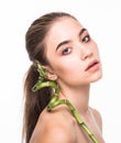 Portrait beautiful woman face portrait with green leaf , concept for skin care or organic cosmetics Royalty Free Stock Photo