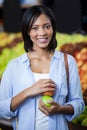 Portrait of beautiful woman holding an apples Royalty Free Stock Photo