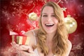 Portrait of beautiful woman holding christmas gift Royalty Free Stock Photo