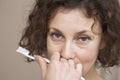 Portrait Of Beautiful Woman Holding Toothbrush