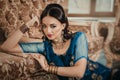 portrait of a beautiful woman in Indian traditional Chinese dres