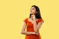 Portrait of beautiful woman isolated on yellow studio background Royalty Free Stock Photo