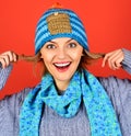 Portrait of beautiful woman in knitted hat, scarf and sweater. Smiling girl in in winter clothes. Women autumn-winter Royalty Free Stock Photo