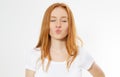 Portrait Beautiful woman and long red hair hblows kiss, demonstrates her good feelings, says goodbye on distance, isolated over Royalty Free Stock Photo