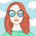 Portrait of a beautiful woman with long red hair in mirrored glasses. Royalty Free Stock Photo