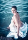 Portrait of a beautiful woman bather in a sea