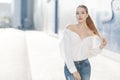 Portrait of a beautiful woman outdoors in summer