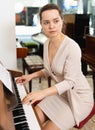 Portrait beautiful woman playing piano Royalty Free Stock Photo