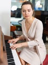 Portrait beautiful woman playing piano Royalty Free Stock Photo