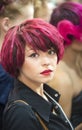 Portrait of beautiful woman with red hair at the hair fashion show