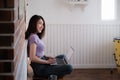 Portrait of beautiful woman and smiling using video call on laptop computer with her parents. Quarantine and work from home Royalty Free Stock Photo