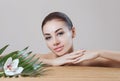 Portrait of a beautiful woman in a spa salon in front of a beauty treatment.