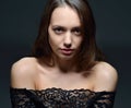 Portrait of the beautiful woman t in black lace blouse. Royalty Free Stock Photo