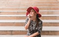 Portrait beautiful woman using smartphone and sittiing on stair,Happy and smiling Royalty Free Stock Photo