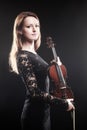 Portrait of beautiful woman with violin Royalty Free Stock Photo