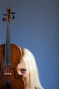 Portrait of a beautiful woman with violine Royalty Free Stock Photo