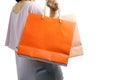 Portrait of beautiful woman wearing casual dress and holding colorful shopping bags Royalty Free Stock Photo