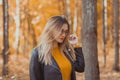 Portrait of beautiful woman wearing fashion glasses during the autumn. Stylish youth and fall season concept. Royalty Free Stock Photo