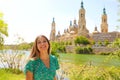 Portrait beautiful woman with Zaragoza landmark landscape, Spain