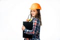 Portrait of beautiful worker model with hard hat and yellow glasses touching her lips isolated on white background Royalty Free Stock Photo