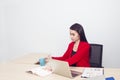 Portrait of beautiful 20-30 years.Young businesswoman in red suit