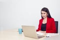 Portrait of beautiful 20-30 years.Young businesswoman in red suit