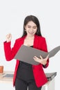 Portrait of beautiful 20-30 years.Young businesswoman in red suit