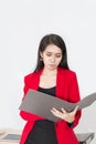 Portrait of beautiful 20-30 years.Young businesswoman in red suit