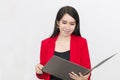 Portrait of beautiful 20-30 years.Young businesswoman in red suit