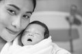 Portrait of beautiful young asian mother with her new born baby Royalty Free Stock Photo