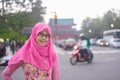 Portrait of beautiful young Asian muslim woman in street of Japan face smiling at camera with happy expression Royalty Free Stock Photo