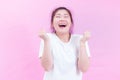 Portrait of beautiful Young Asian woman black hair wear a white t-shirt with surprised excited happy screaming.