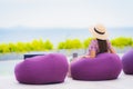 Portrait beautiful young asian woman looking at sea ocean with happy smile for relax leisure in vacation Royalty Free Stock Photo