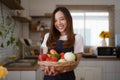 Portrait of beautiful young asian woman making salad at home. cooking food and Lifestyle moment Royalty Free Stock Photo