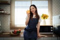 Portrait of beautiful young asian woman making salad at home. cooking food and Lifestyle moment Royalty Free Stock Photo