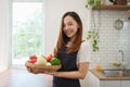 Portrait of beautiful young asian woman making salad at home. cooking food and Lifestyle moment Royalty Free Stock Photo