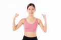 Portrait of beautiful young asian woman in sportswear showing strong muscles isolated on white background. Royalty Free Stock Photo