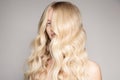 Portrait Of A Beautiful Young Blond Woman With Long Wavy Hair. Royalty Free Stock Photo