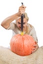 Portrait of beautiful young blonde woman with pumpkin ready for halloween celebration, mockup for postcard and invitation or adver