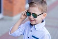 Portrait of a beautiful young boy outdoors