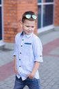 Portrait of a beautiful young boy outdoors