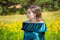 Portrait of beautiful young brunette woman in a garden Royalty Free Stock Photo