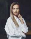 Beautiful business woman. Blonde in white shirt. Purposeful woman posing with crossed arms. female portrait.