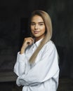 Beautiful business woman. Blonde in white shirt. Purposeful woman posing with crossed arms. Isolated female portrait.