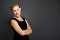 Portrait of a beautiful young business woman standing against gr Royalty Free Stock Photo