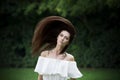 Portrait of a beautiful young caucasian woman with flying long hair, clean skin and casual makeup Royalty Free Stock Photo