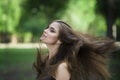 Portrait of a beautiful young caucasian woman with flying long hair, clean skin and casual makeup Royalty Free Stock Photo