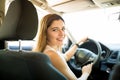 Beautiful woman driving her car Royalty Free Stock Photo